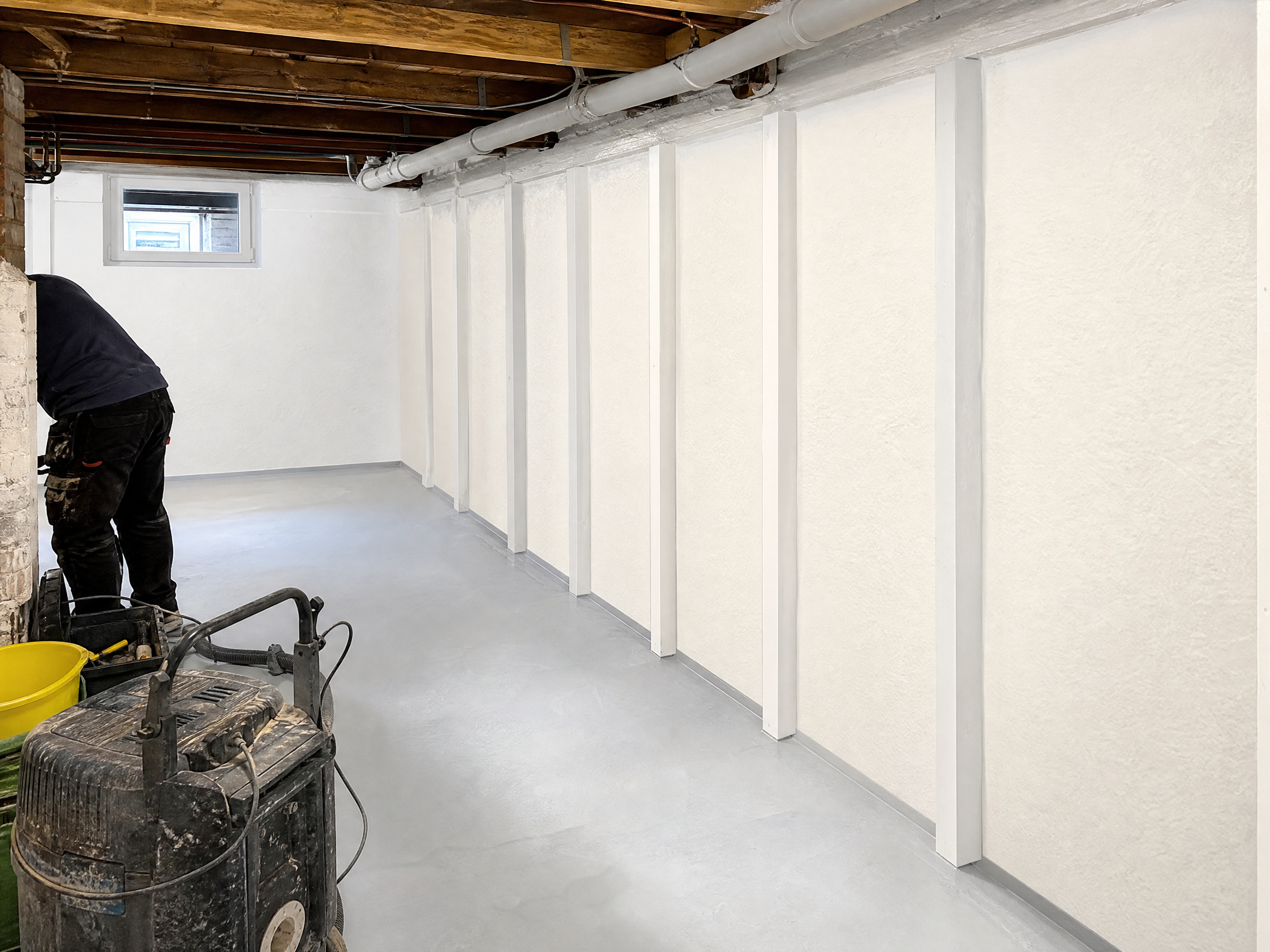 Completed basement waterproofing showing professional quality workmanship in a British home