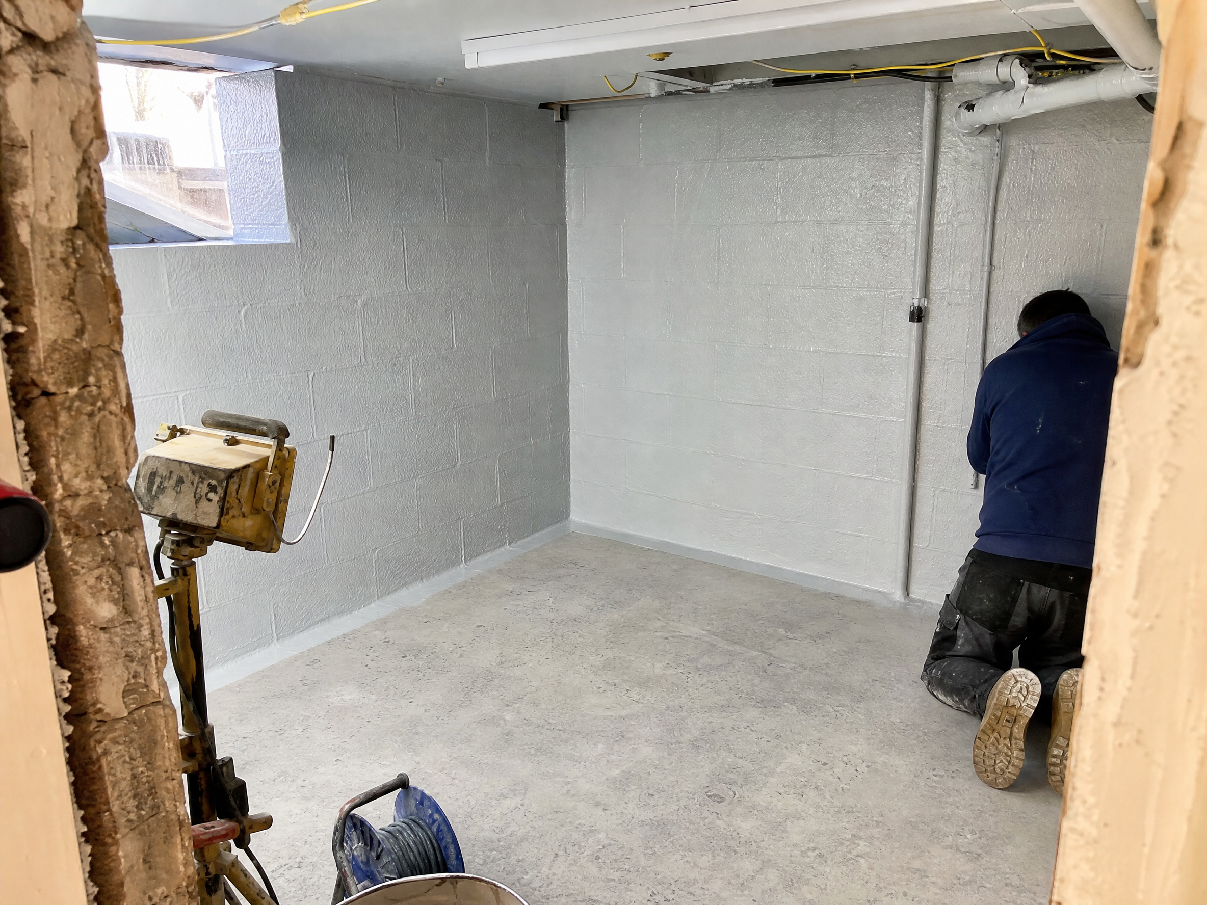 Completed cellar tanking showing professional quality workmanship in a British home