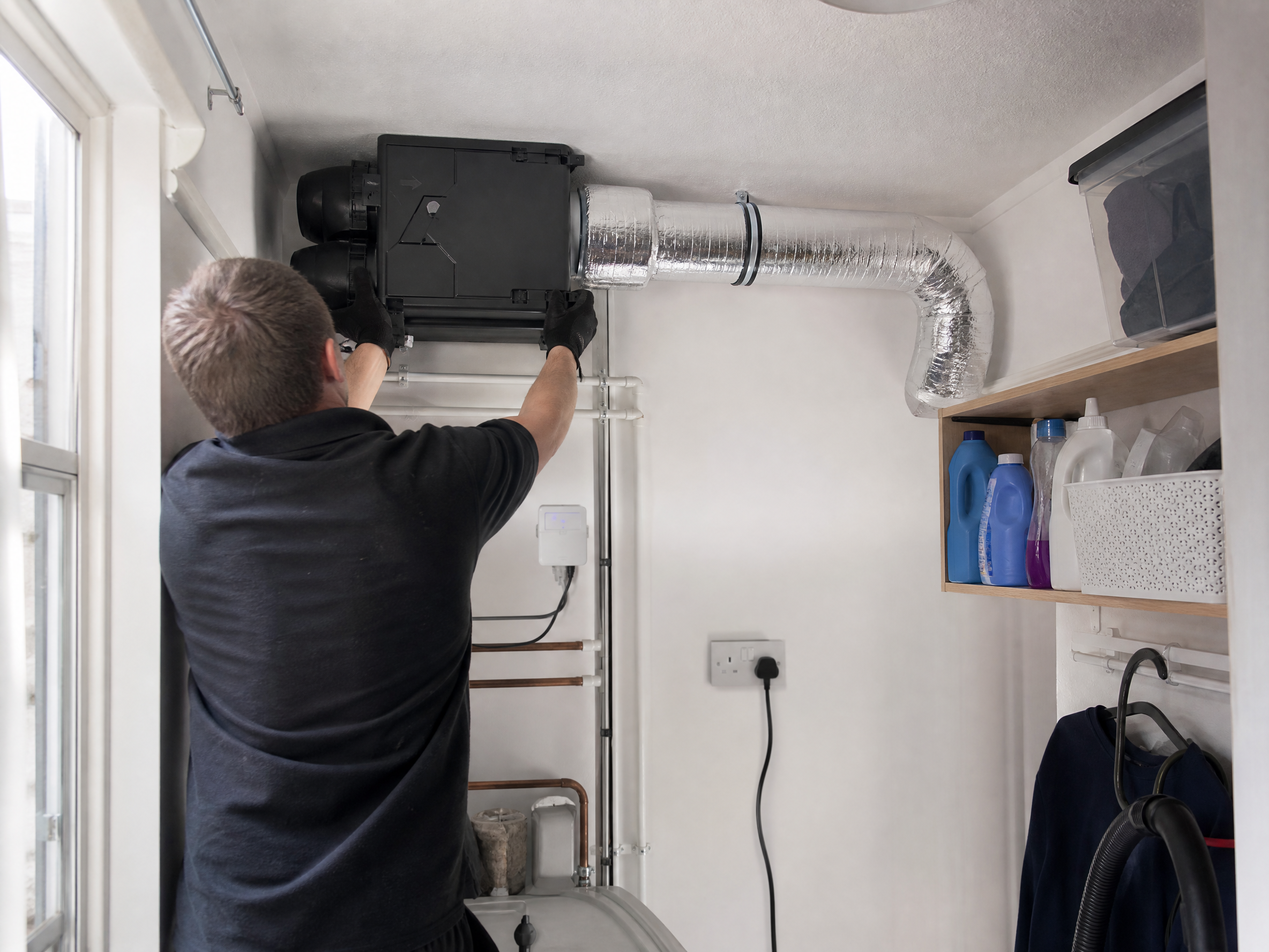 Completed condensation control and ventilation showing professional quality workmanship in a British home