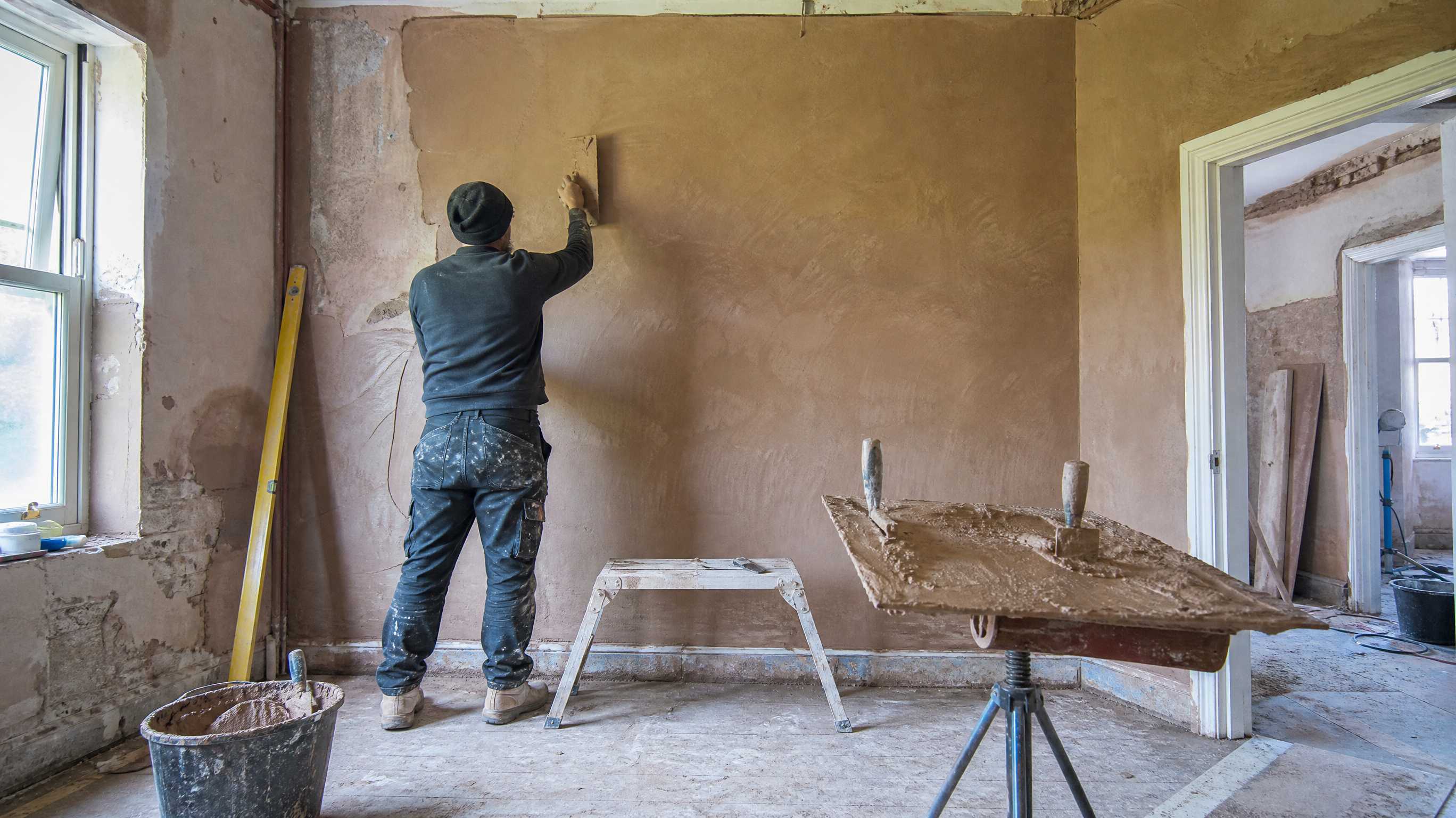 Replastering After Damp Treatment in progress at a British residential property — professional service in Birmingham