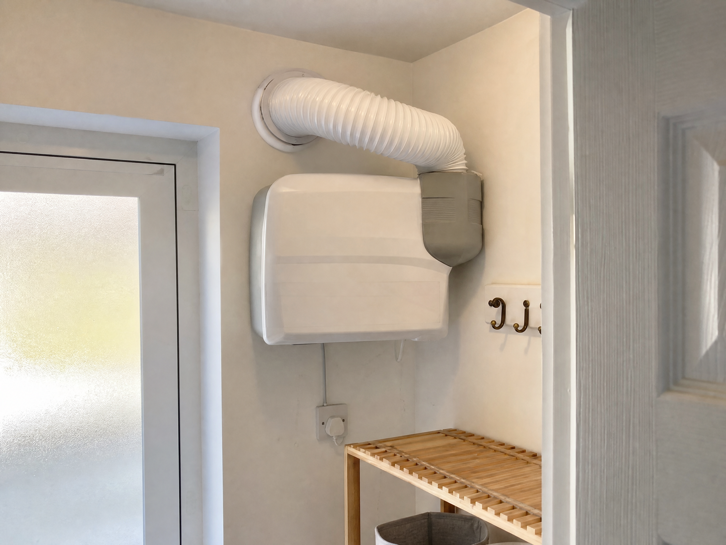 Completed positive input ventilation (piv) installation showing professional quality workmanship in a British home